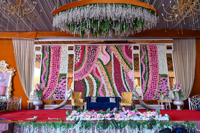 A stage decorated with flowers for a special event.