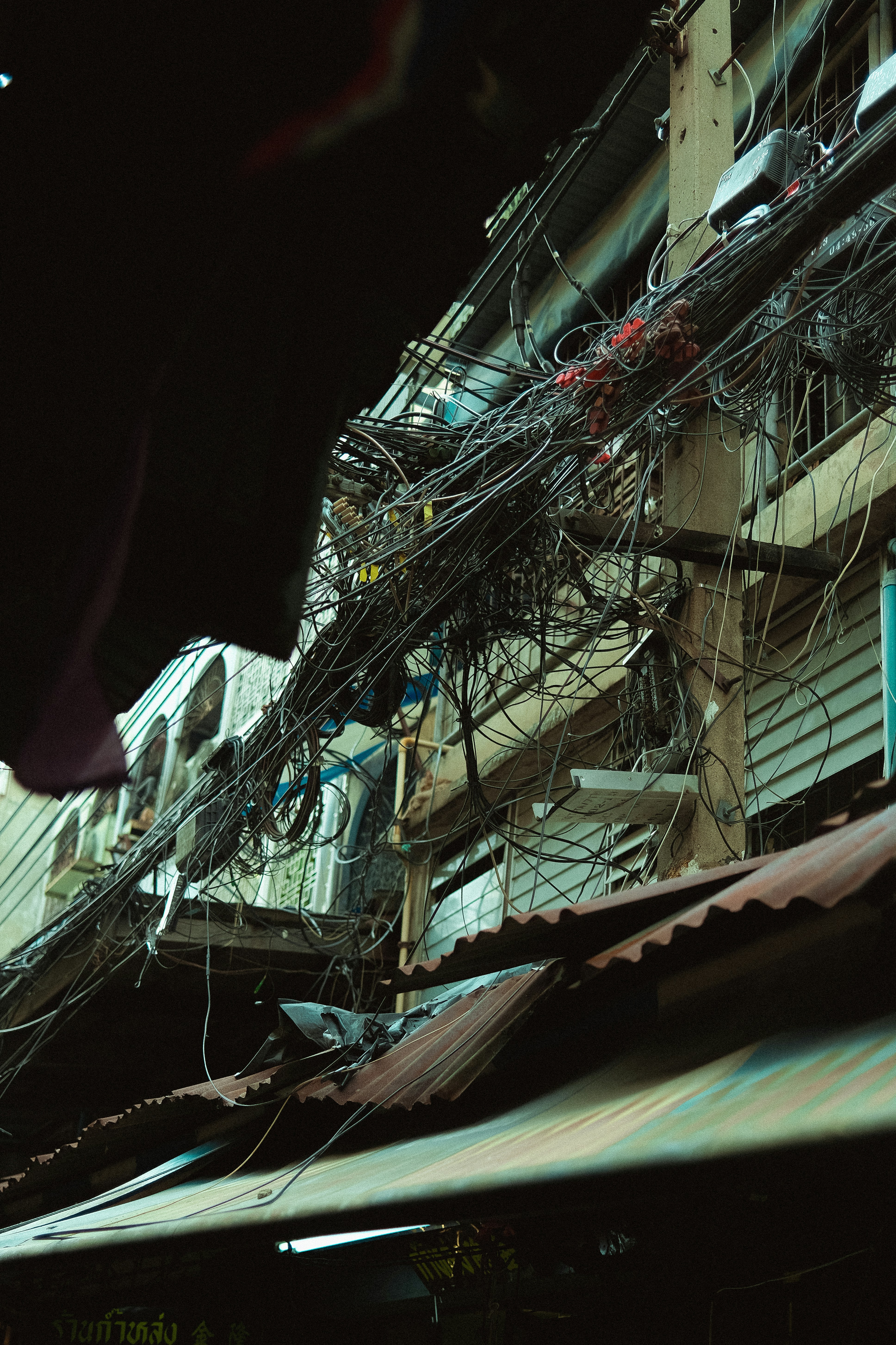 Overhead power lines are a tangled mess.