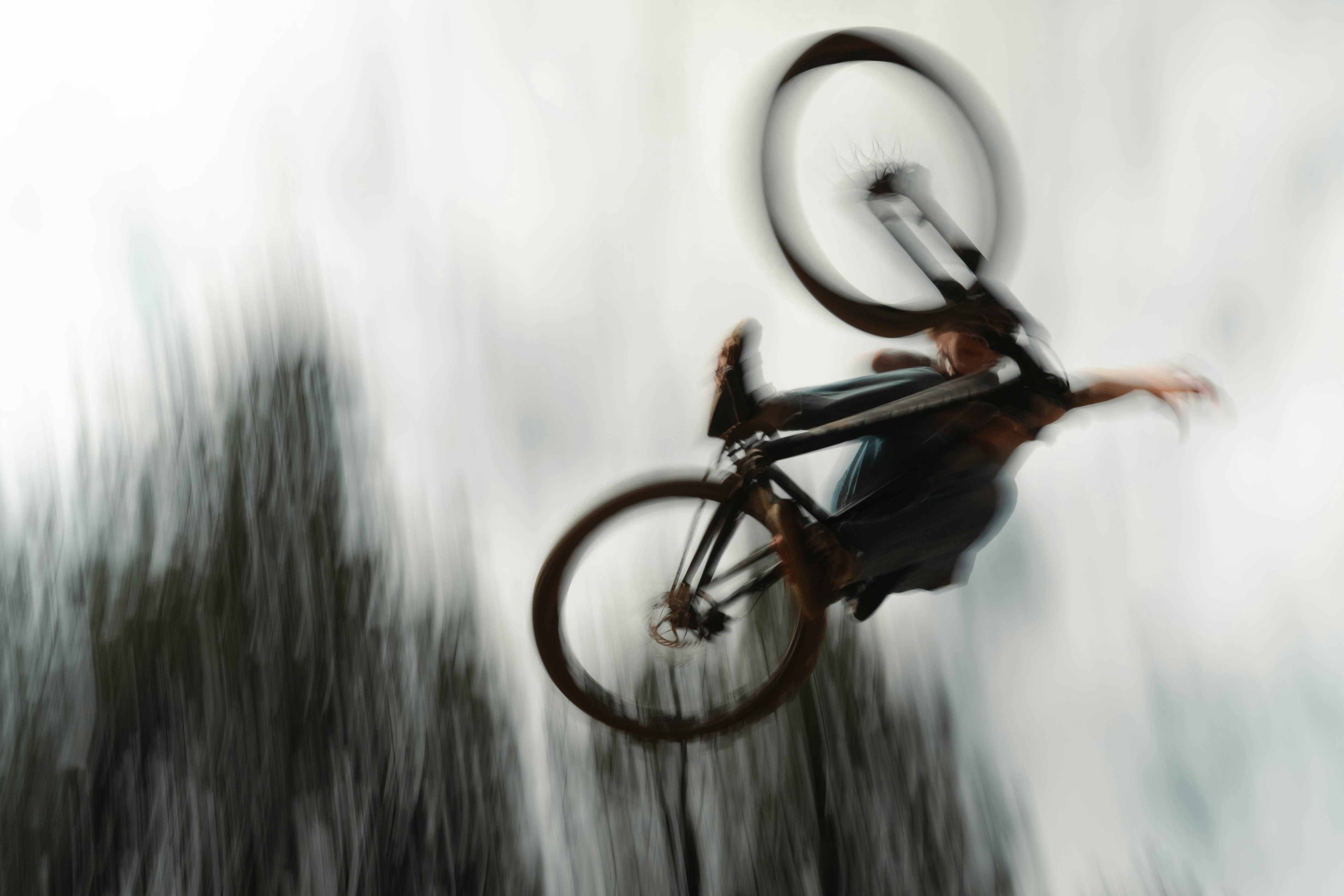 Biker performing a stunt in mid-air.