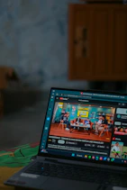 Watching a youtube video on a laptop.