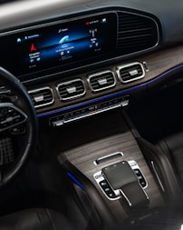 The image displays the interior of a luxury vehicle.