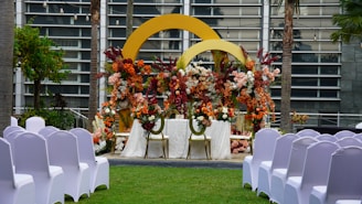 Wedding ceremony setup with beautiful floral arrangements.