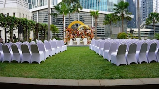 Outdoor wedding venue with chairs ready.