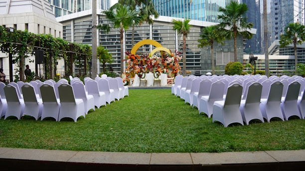 Outdoor wedding venue with chairs ready.