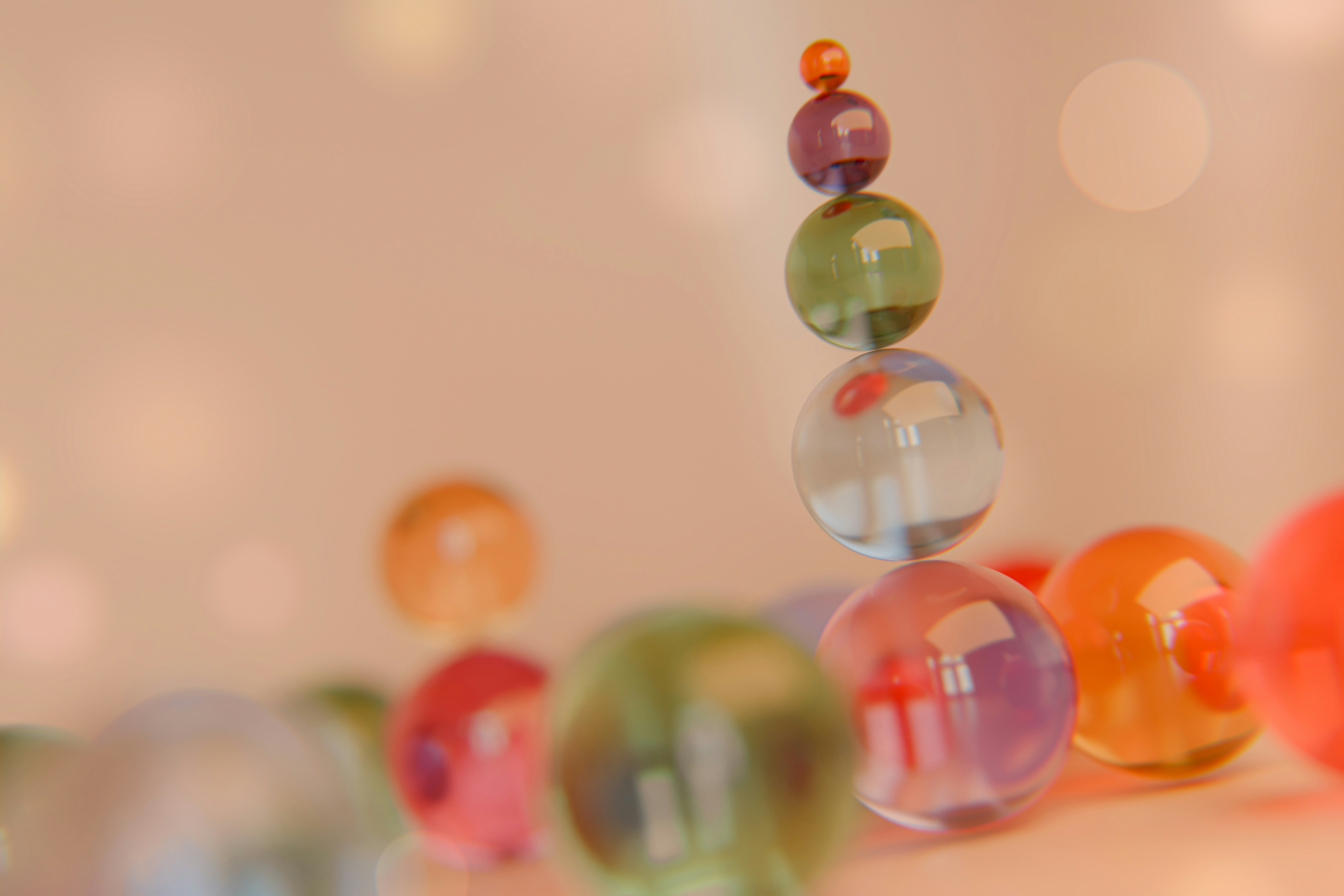 Colorful glass beads are stacked.