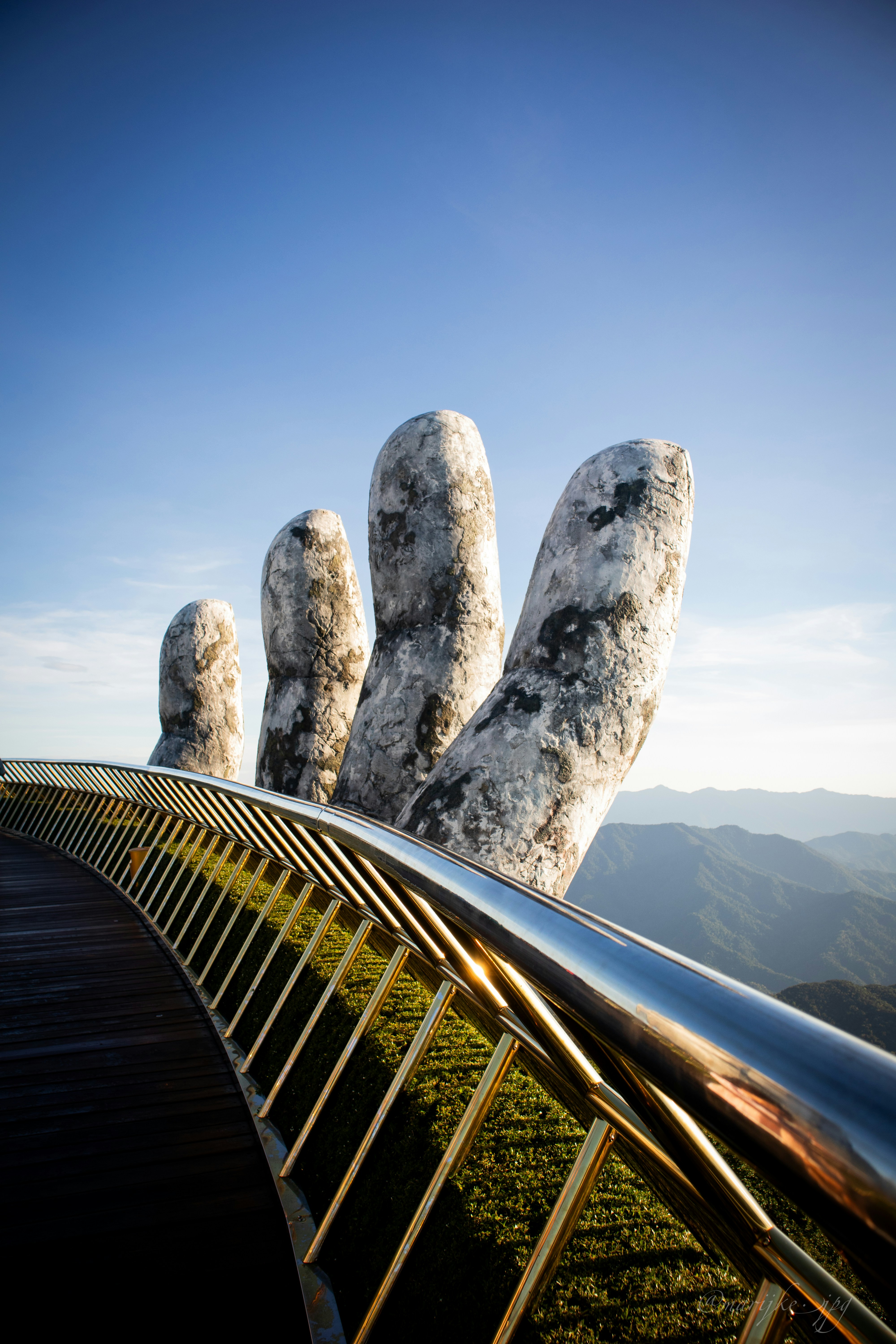 Image of the Golden Bridge with giant stone hands at Ba Na Hills