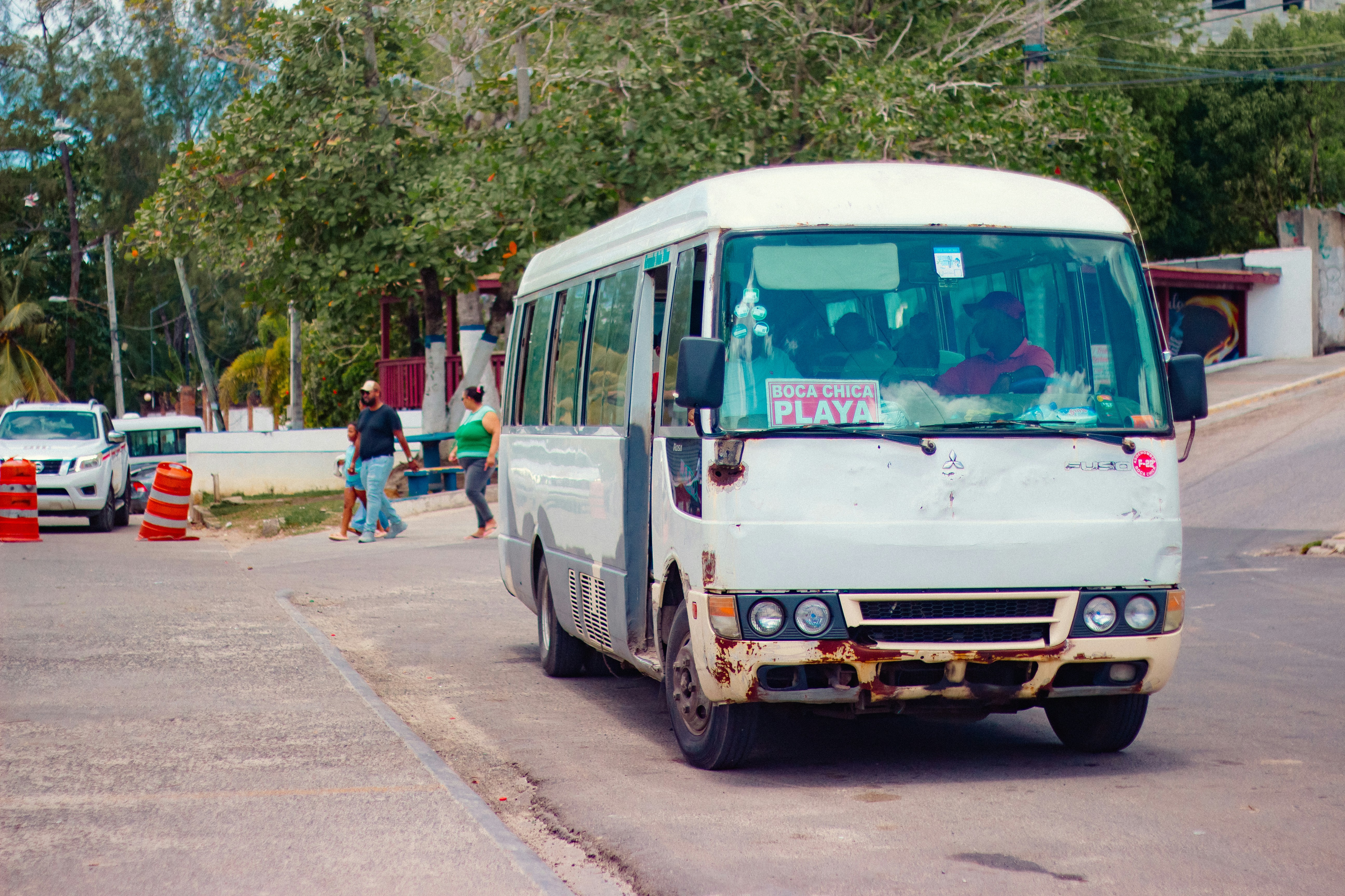 A bus is parked on the side of the road.