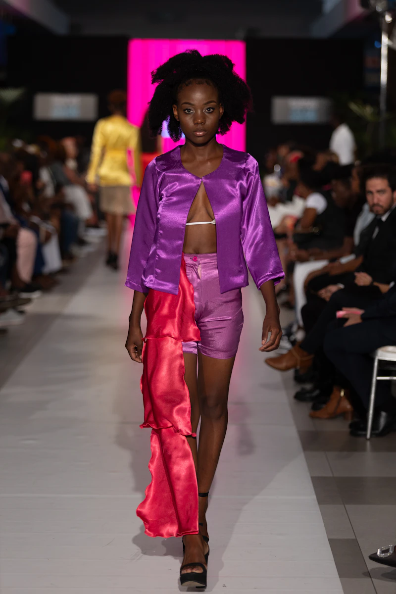 Model walking a runway during a showcase