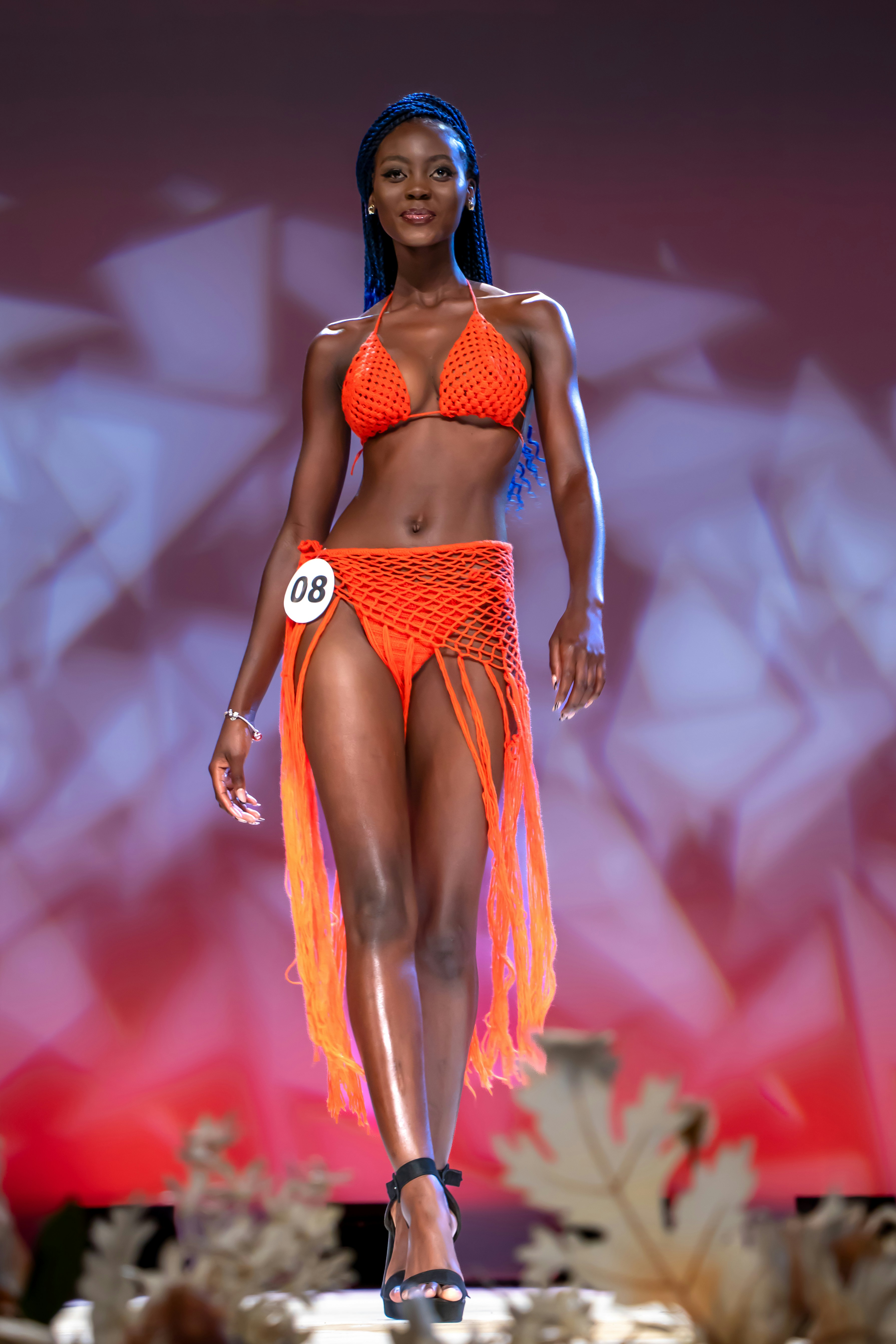 A woman models a bikini during a pageant.