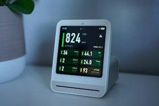 The monitor displays air quality readings.