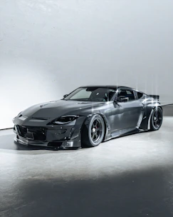 A sleek, sporty car with a modified build.