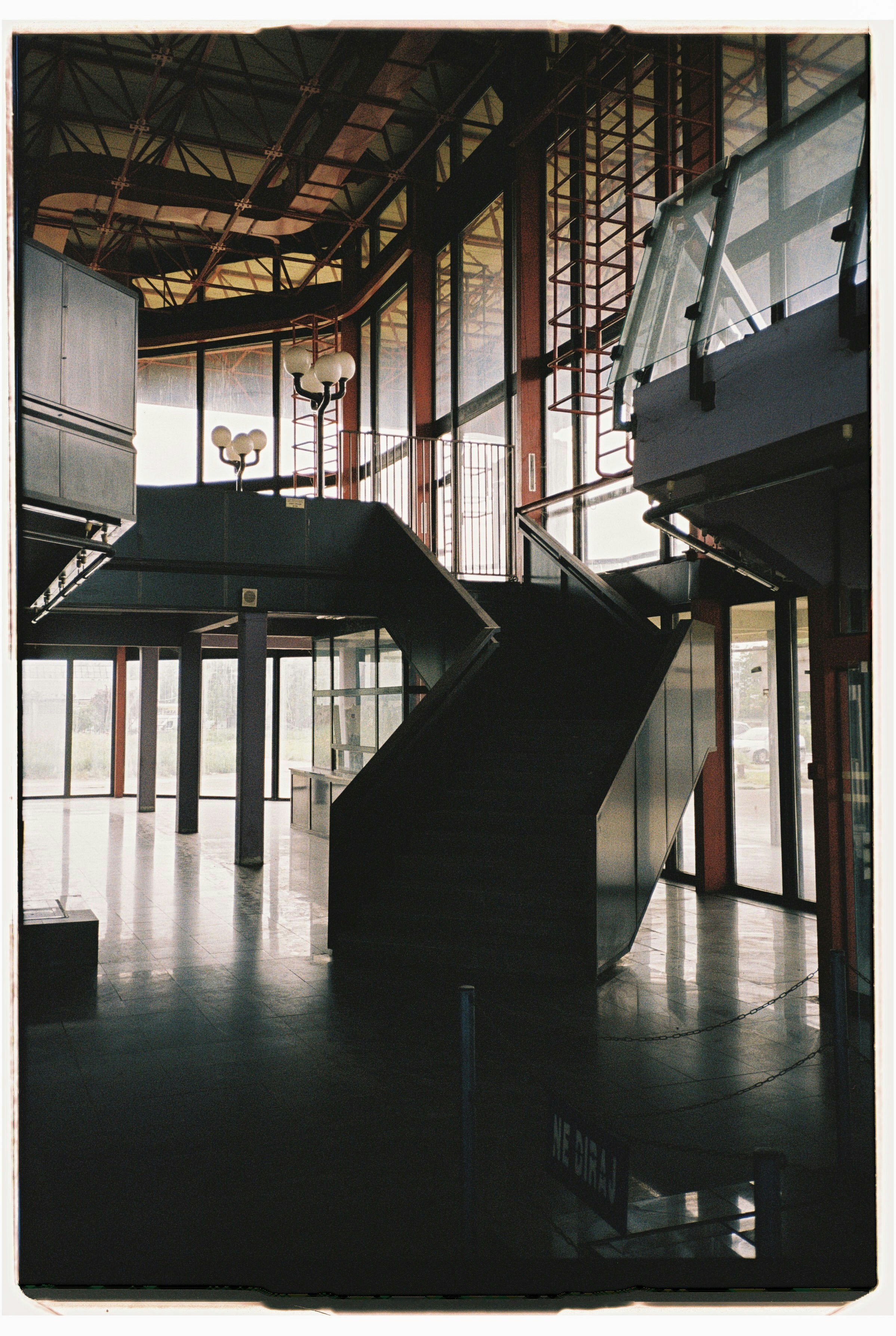 Empty modern interior with a large staircase