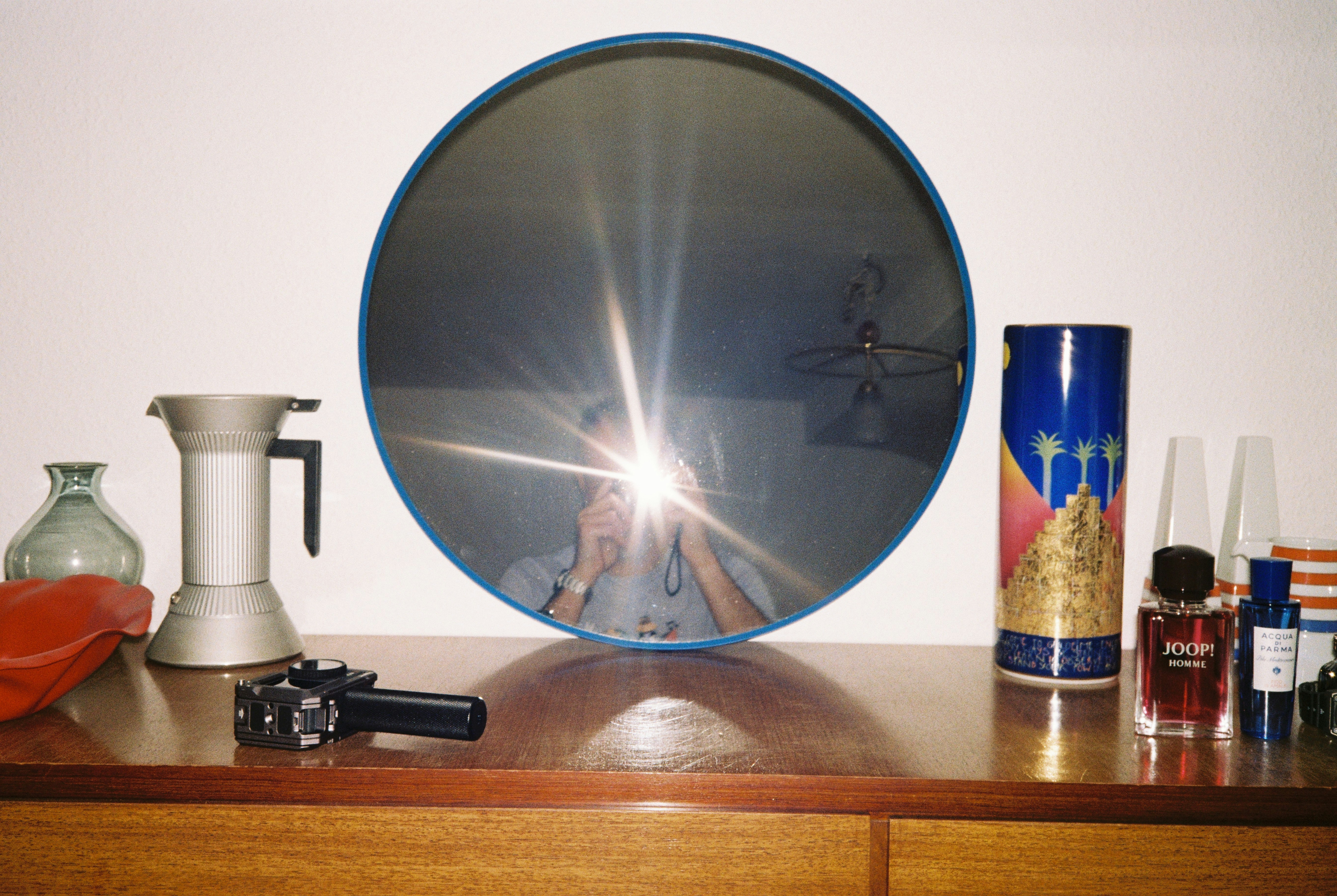 Person taking elegant mirror selfie