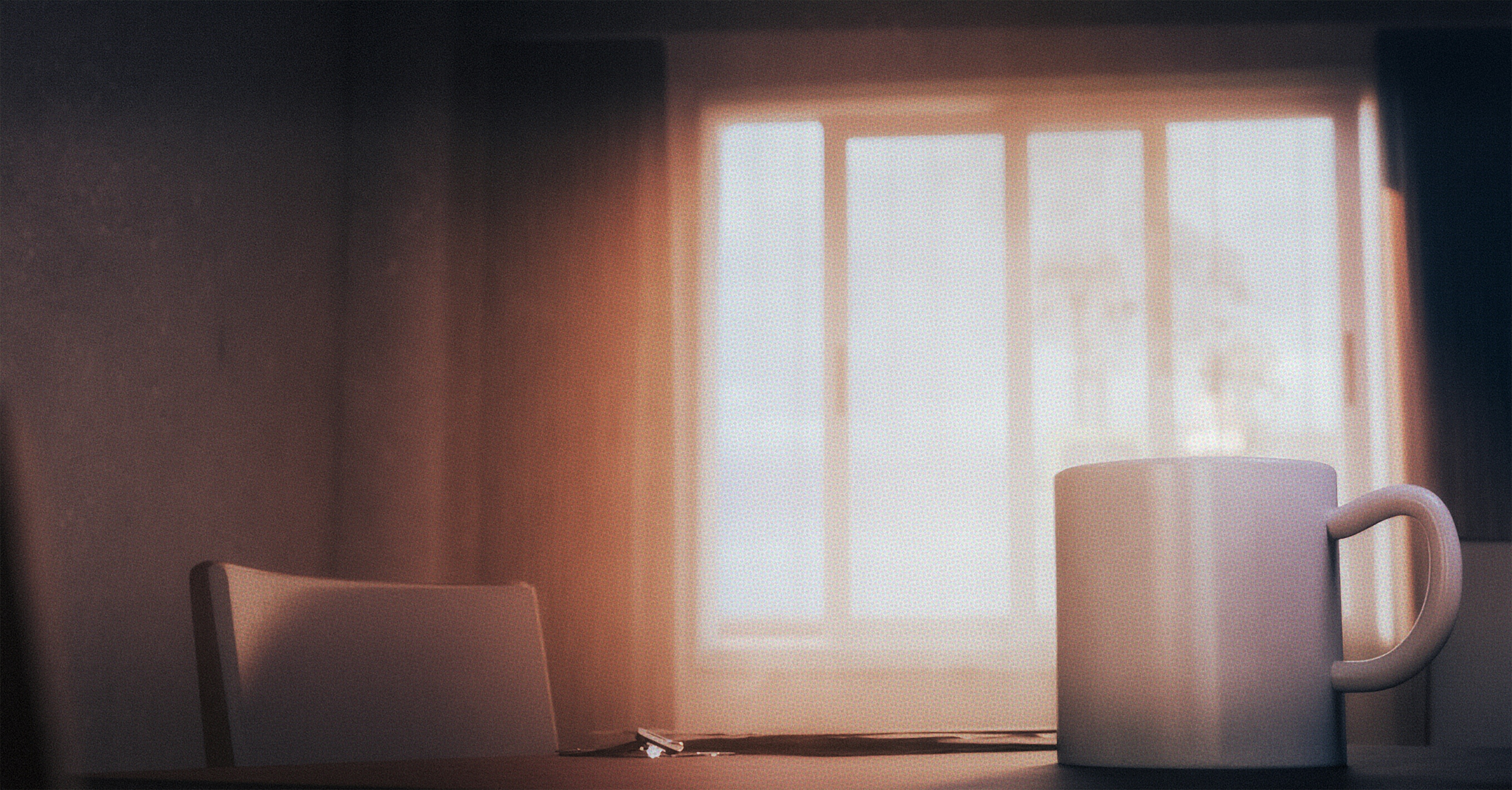 Steaming mug sits near a window.