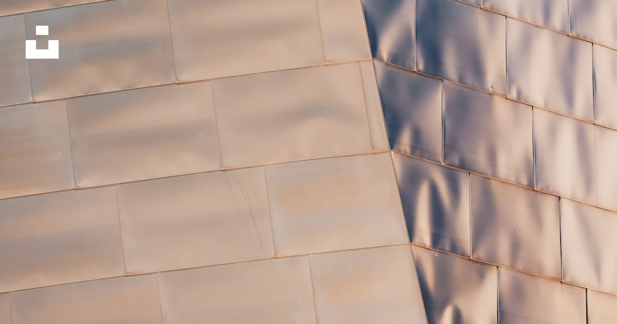 Reflective metal panels reflect light from a building. photo – Free Art ...
