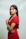 Woman in red dress poses for a photo