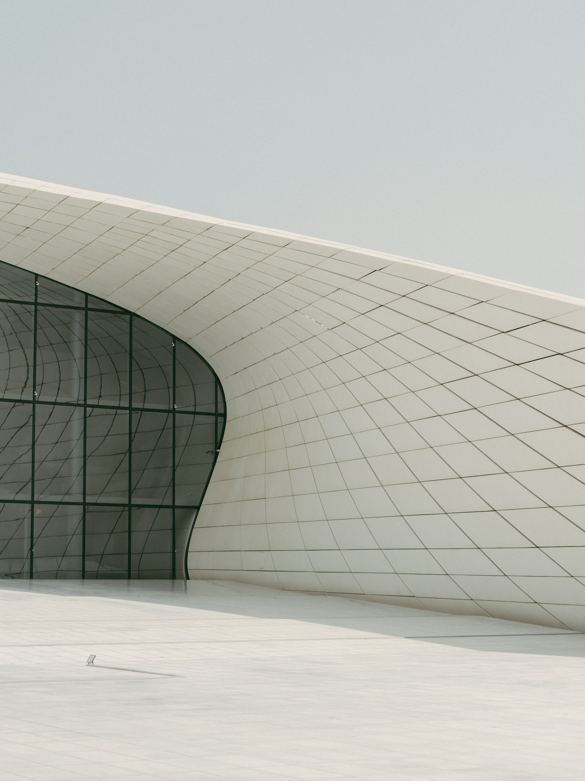 Modern architecture displays graceful curves and clean lines.