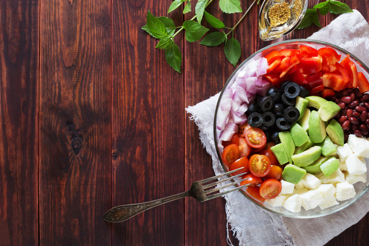 A colorful salad bowl with many fresh ingredients