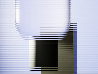 Abstract geometric shapes with color gradients are present
