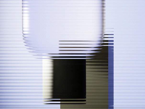 Abstract geometric shapes with color gradients are present