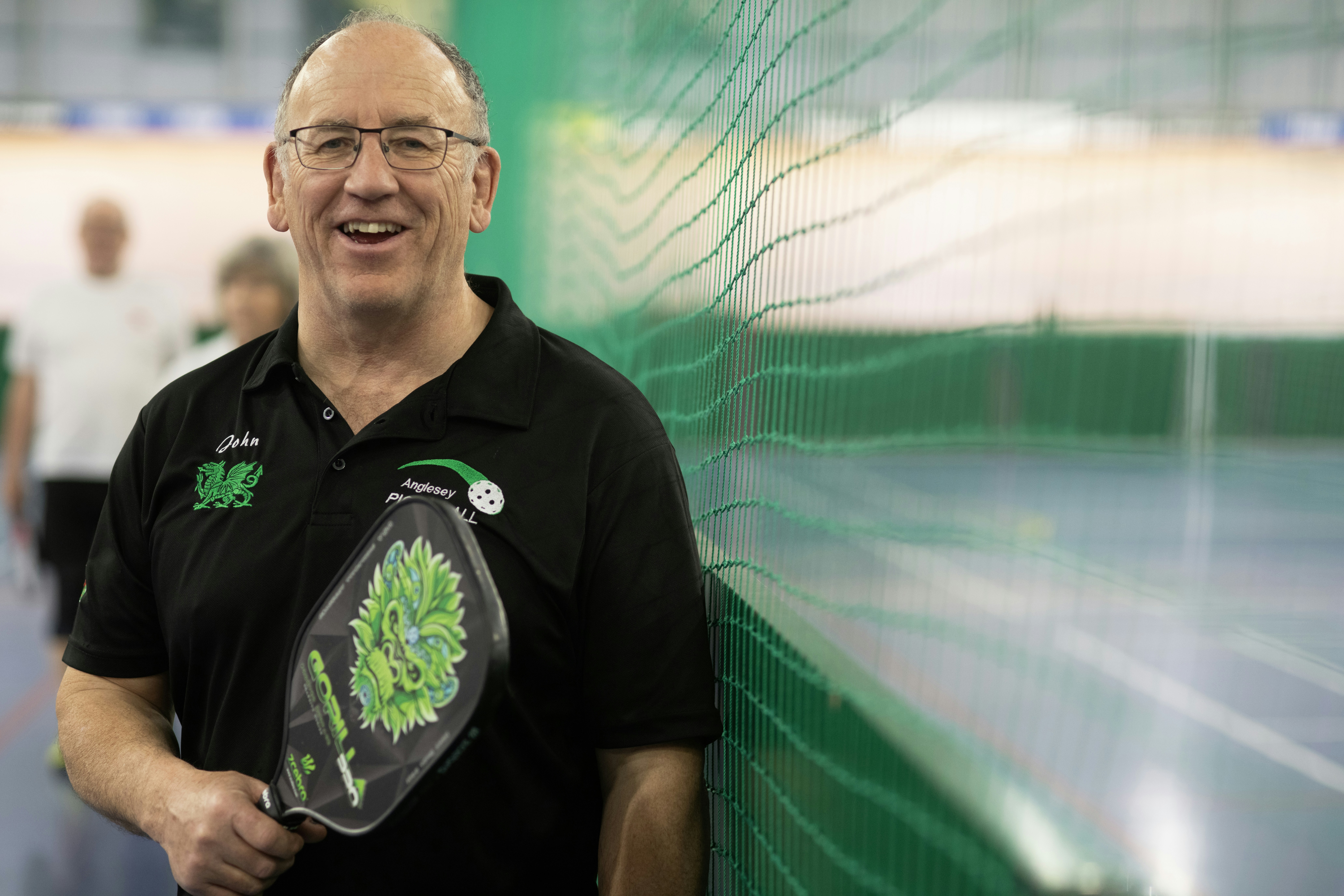 Senior pickleball players socializing