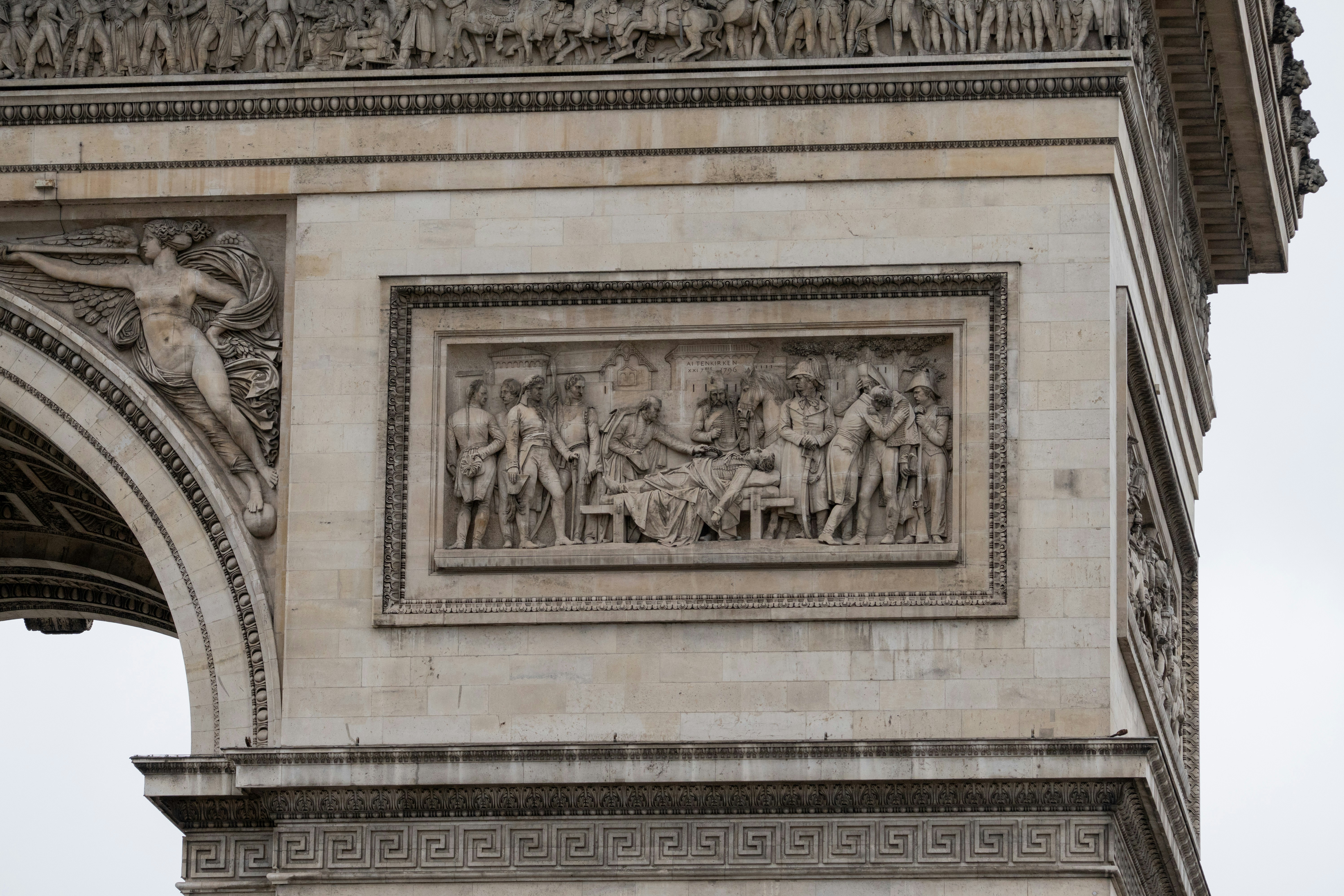 A close-up of the arc de triomphe's sculptures.