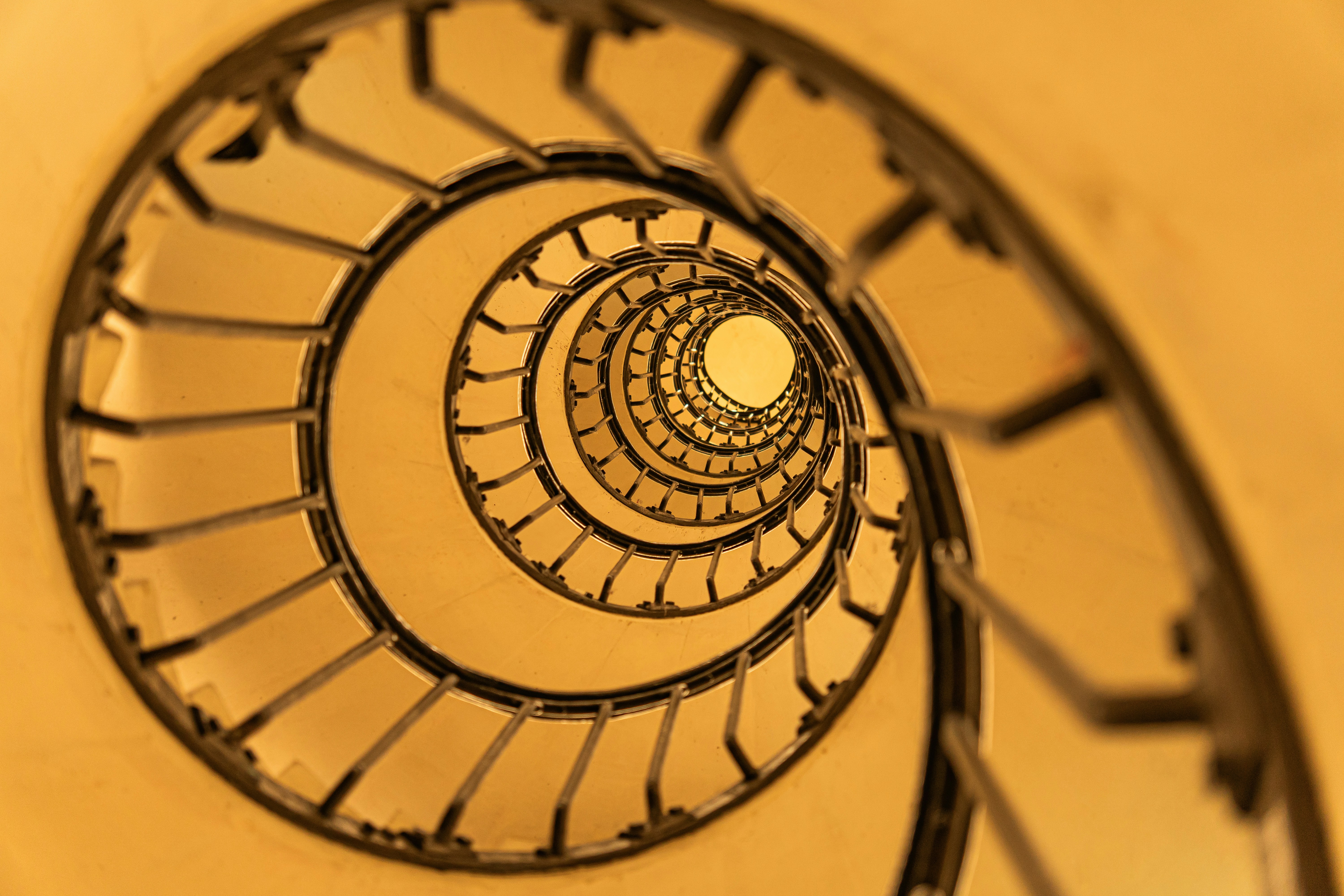 Spiral staircase viewed from below.