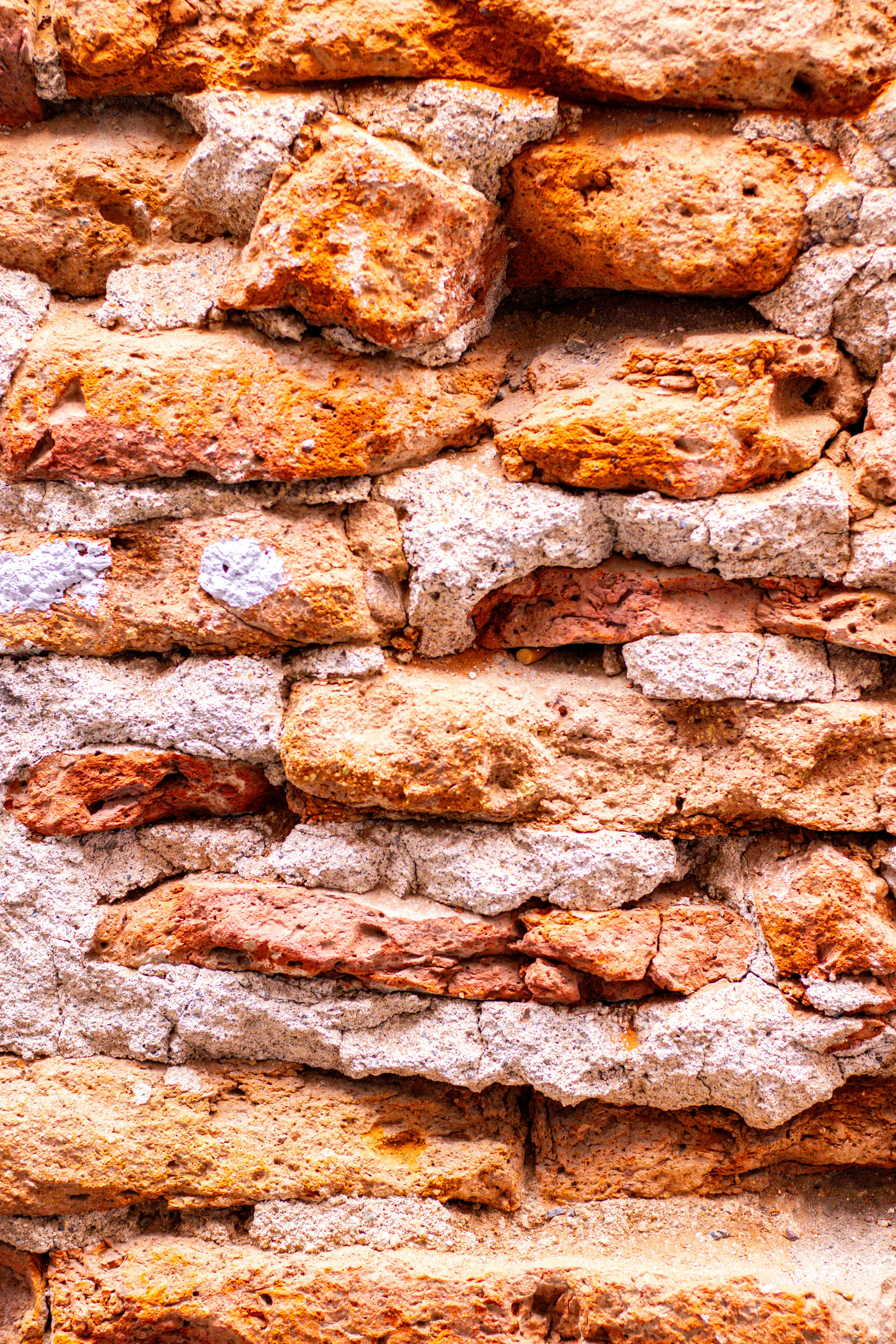 Brick wall with visible mortar.