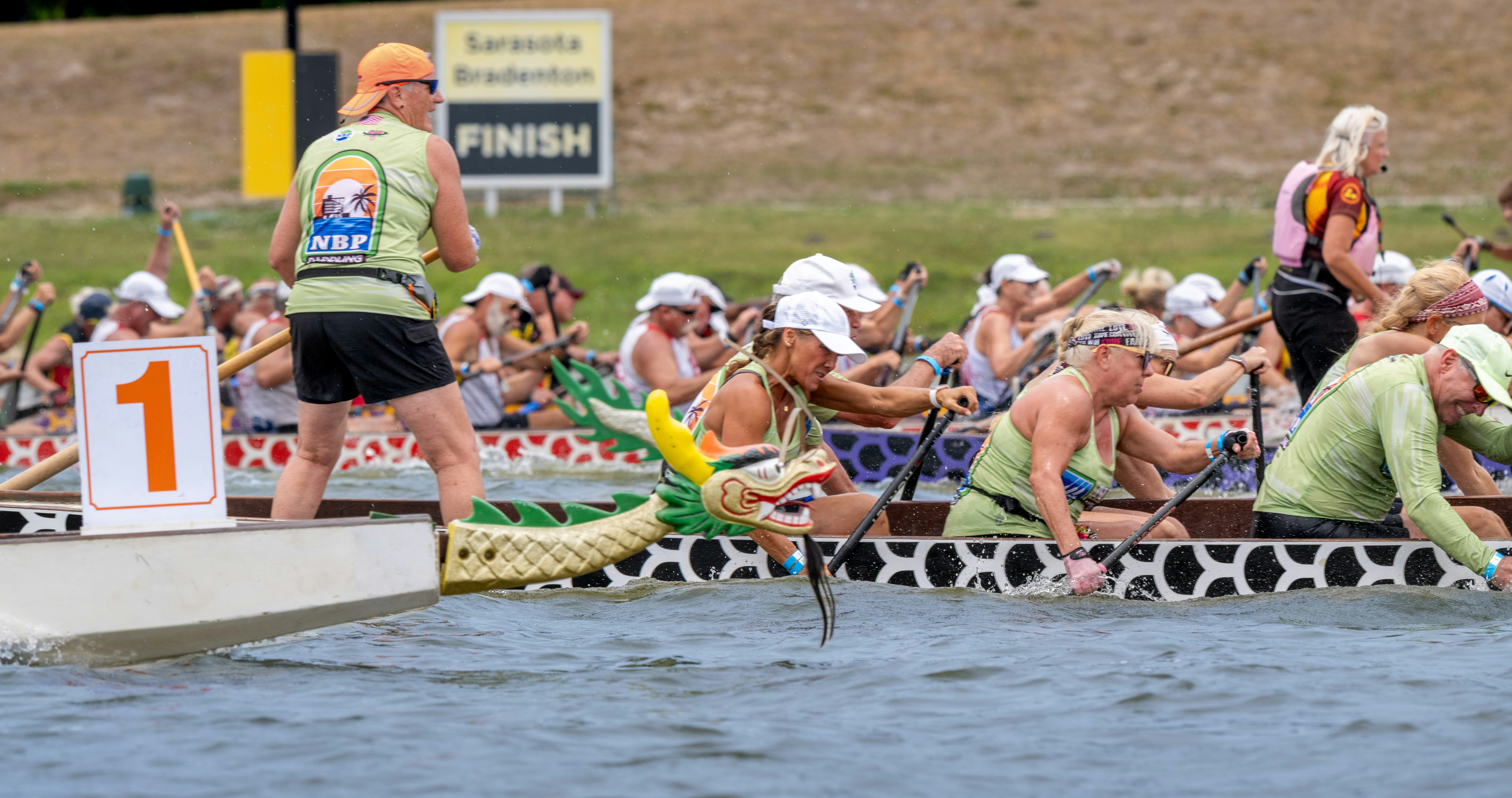 Dragon boat racers prepare for the start of the race.
