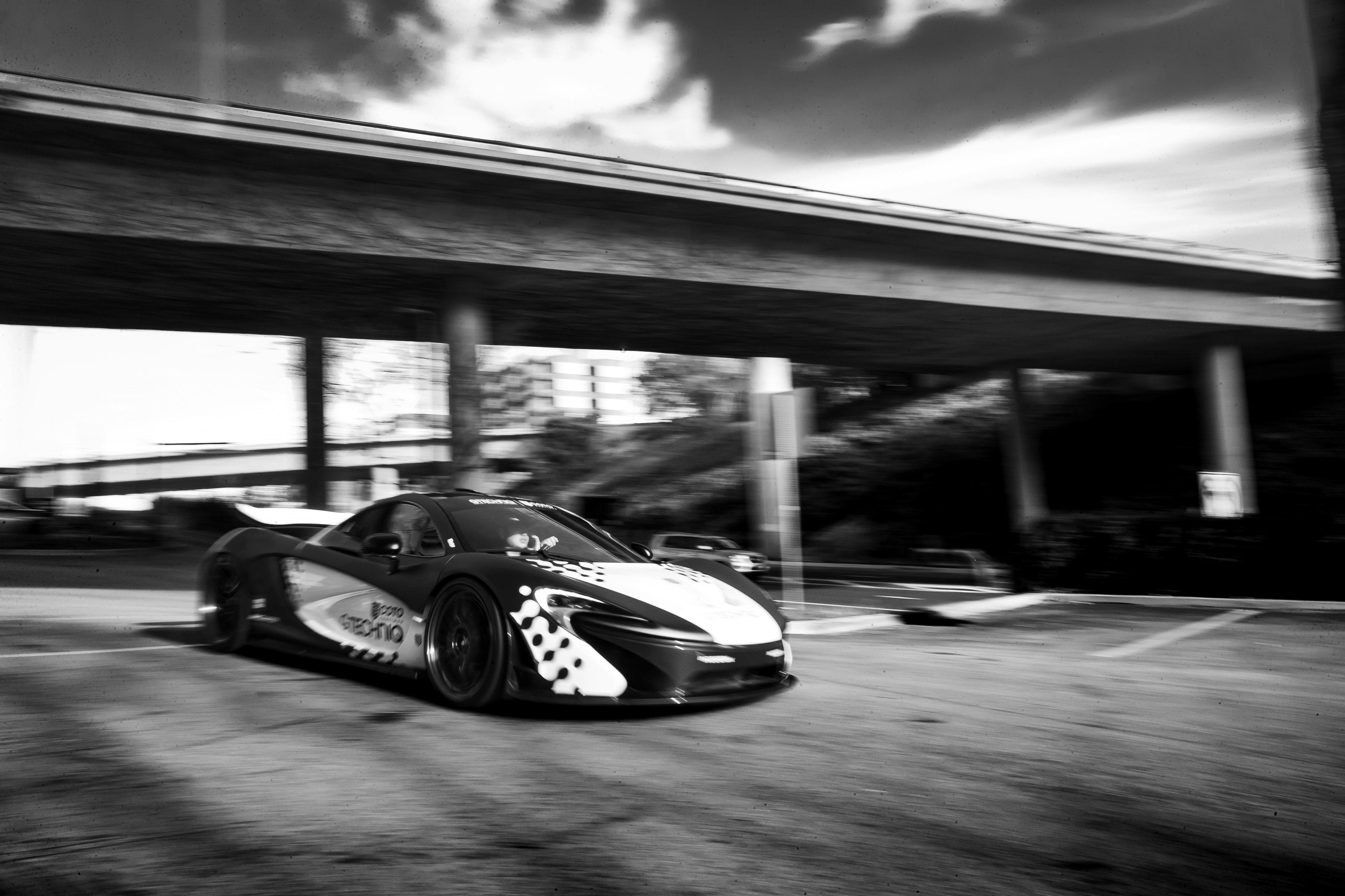 McLaren P1 GTR track, Hypercar race circuit, Luxury car asphalt, Speed blur wallpaper, ilustrasi artikel Unleash the Beast: McLaren P1 GTR 4K Race Track Wallpapers for Your Screen 4