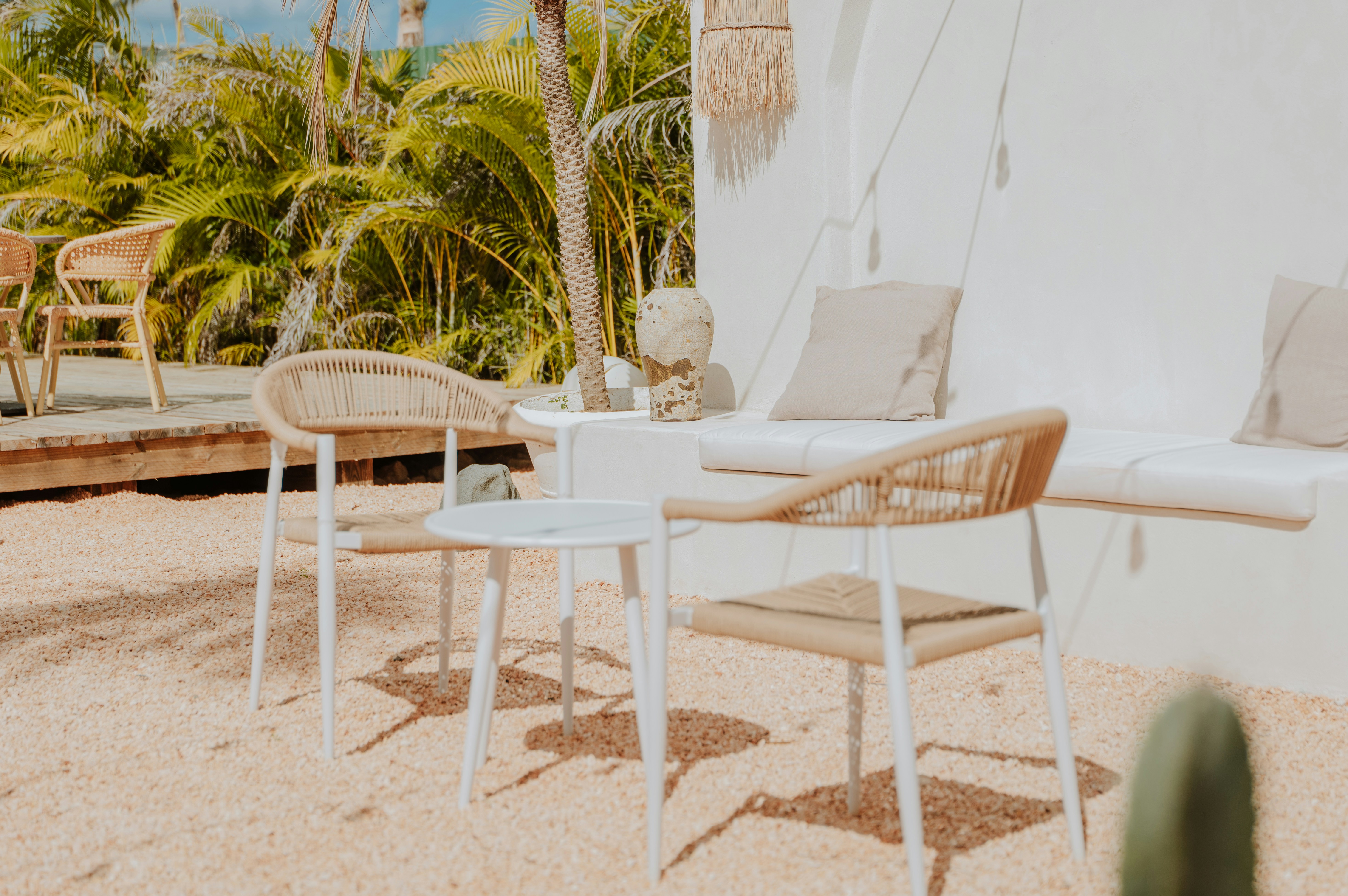 Relaxing outdoor seating area with modern furnishings.