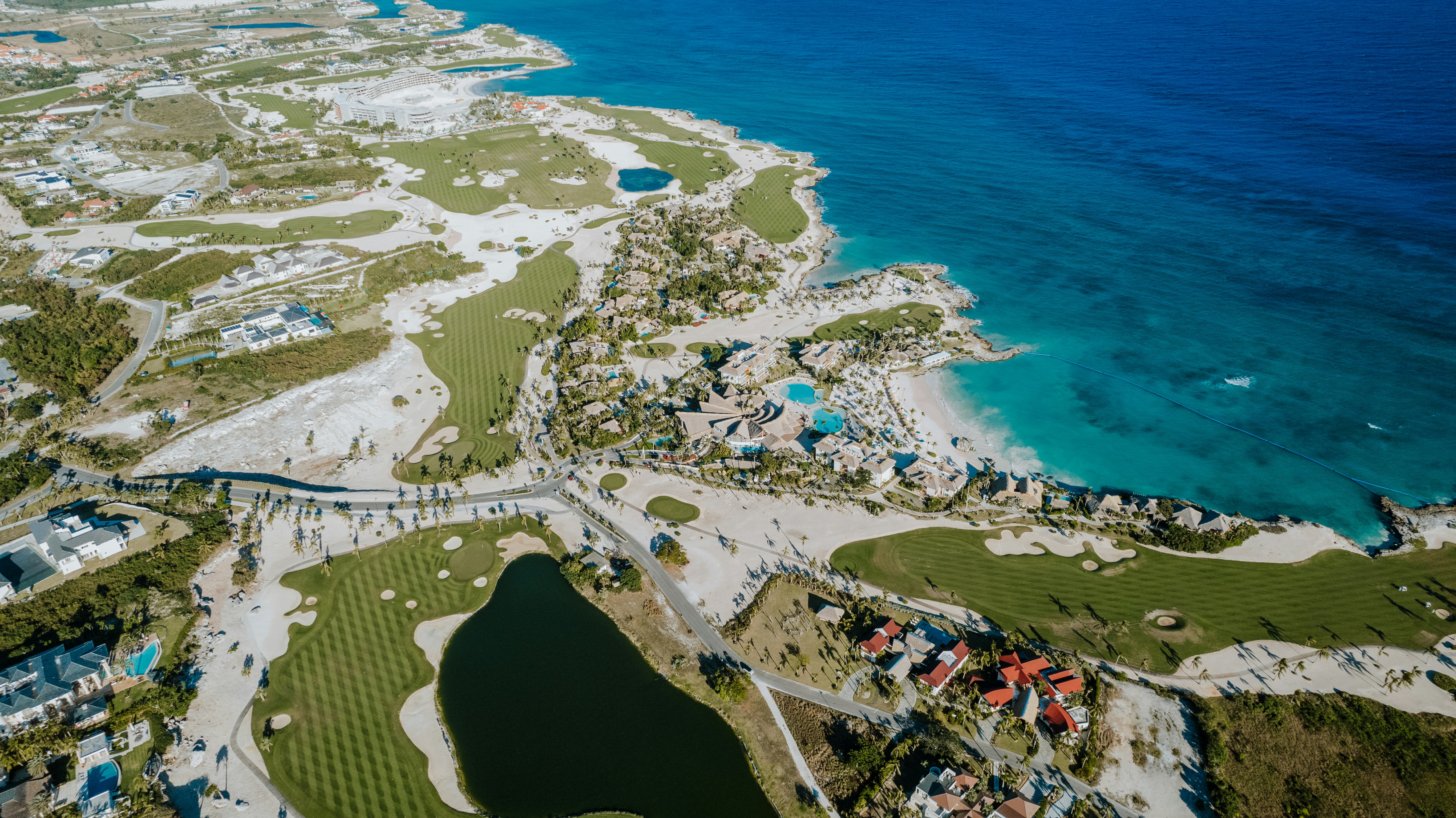 Aerial view of a golf course by the sea