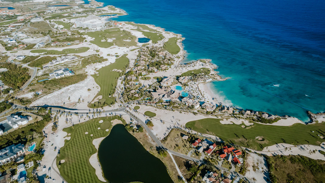 Aerial view of a golf course by the sea