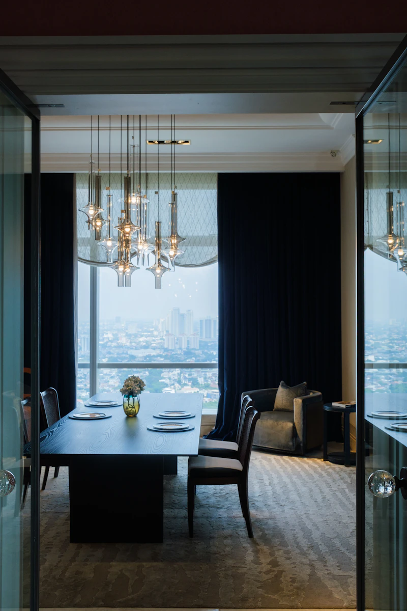 Luxury apartment renovation Dubai — dining space with skyline views