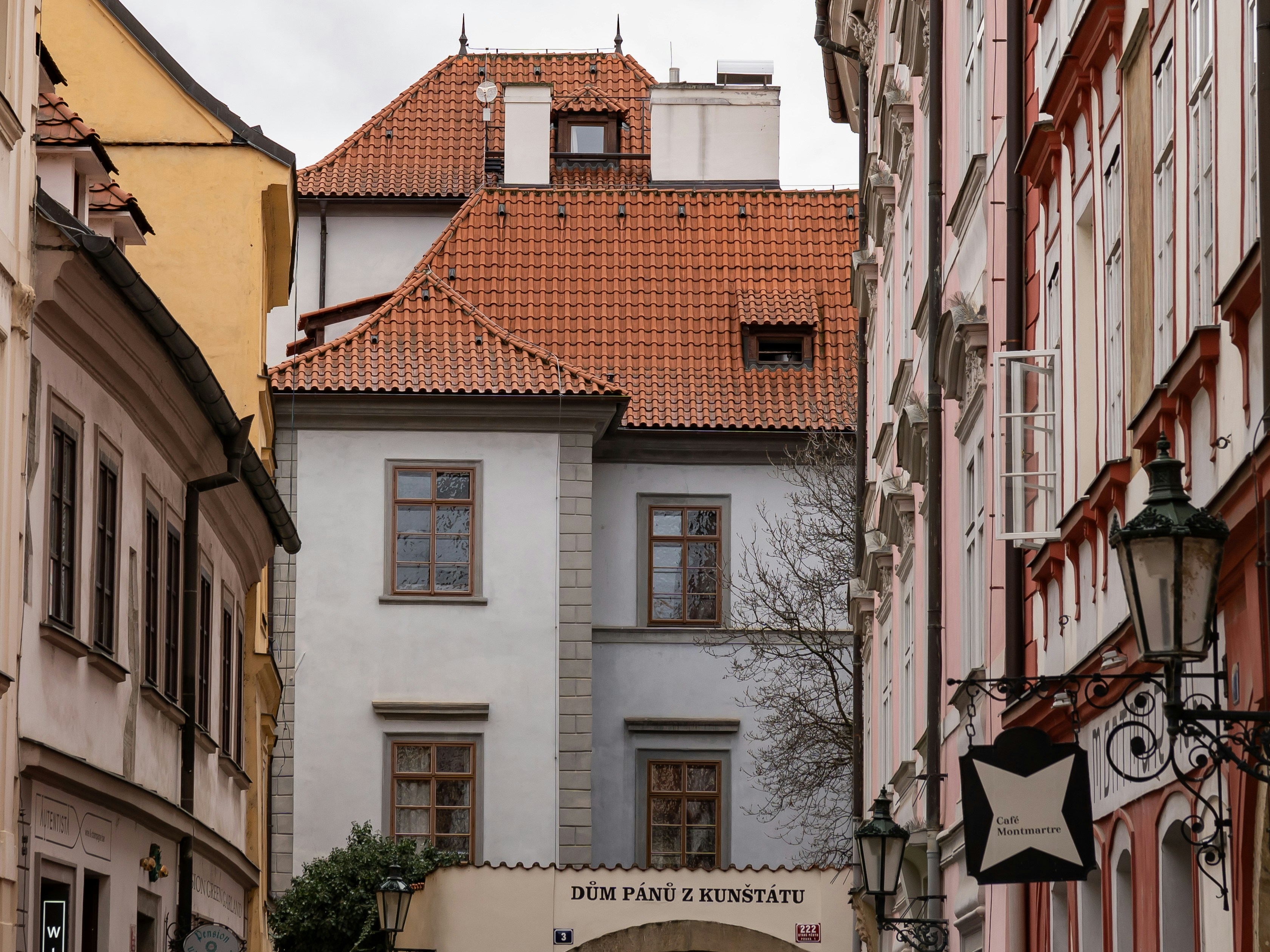 Old buildings and cobblestone street in prague.