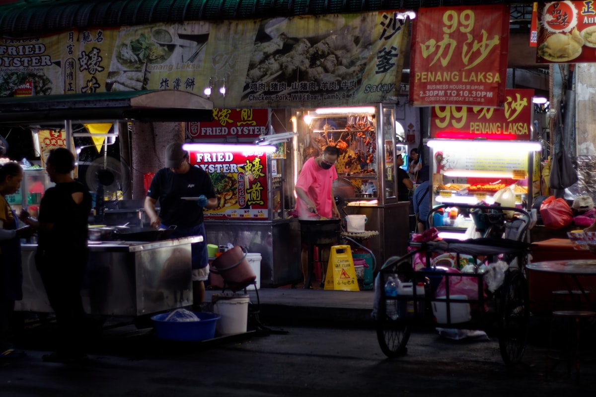 Street food stalls busy at night in George Town, Penang