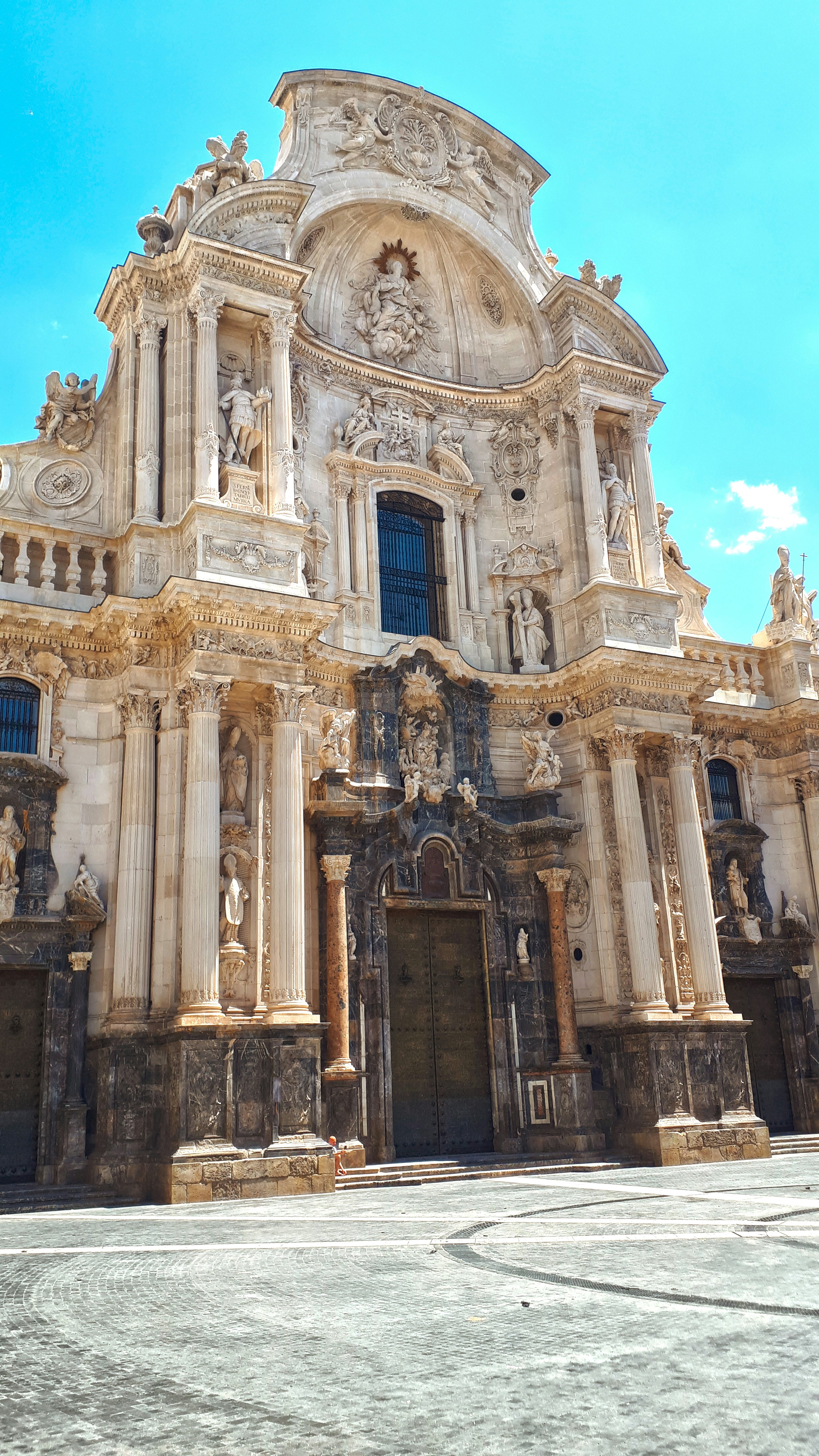 The image shows a detailed, ornate church facade.