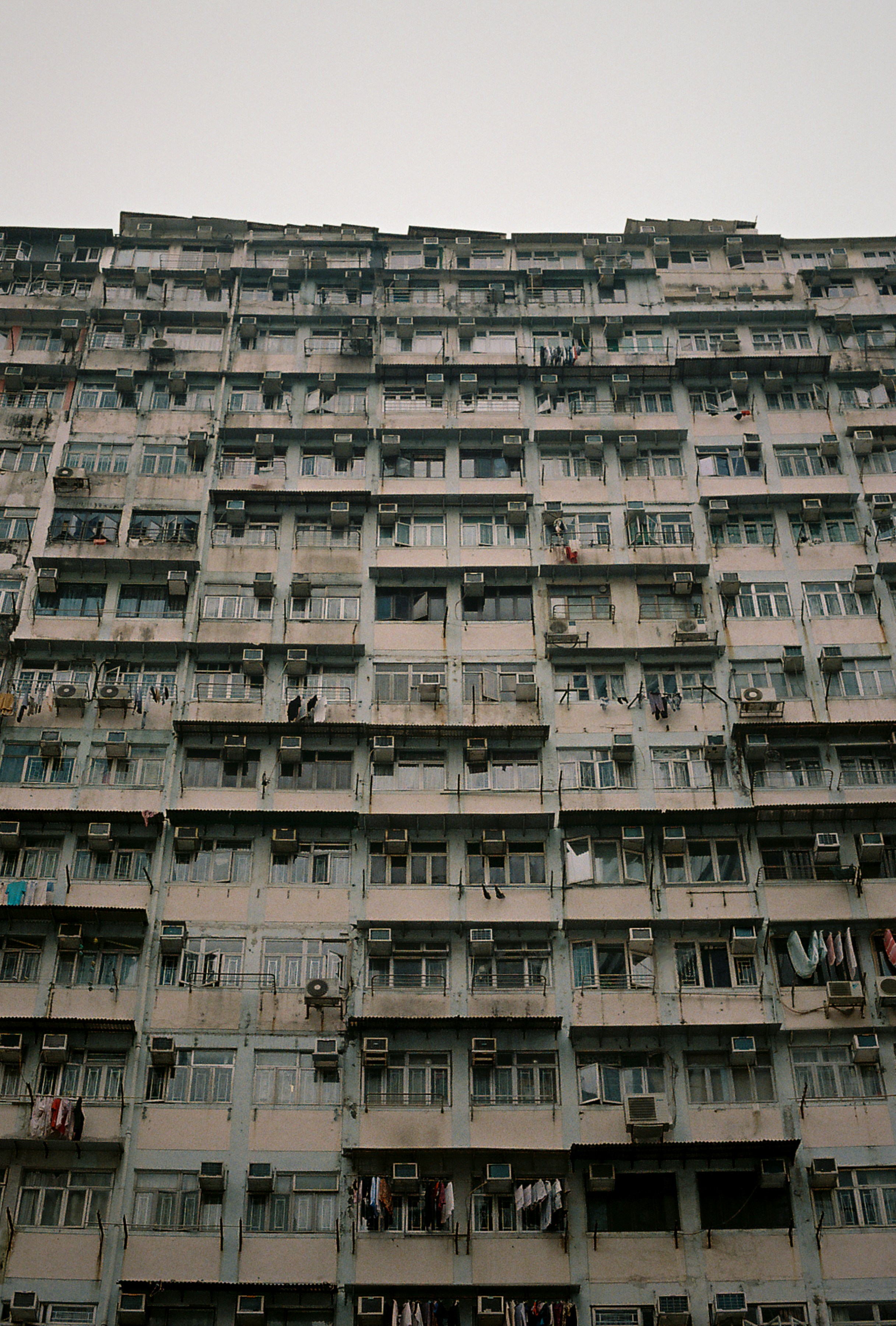 A densely packed apartment building's exterior is shown.