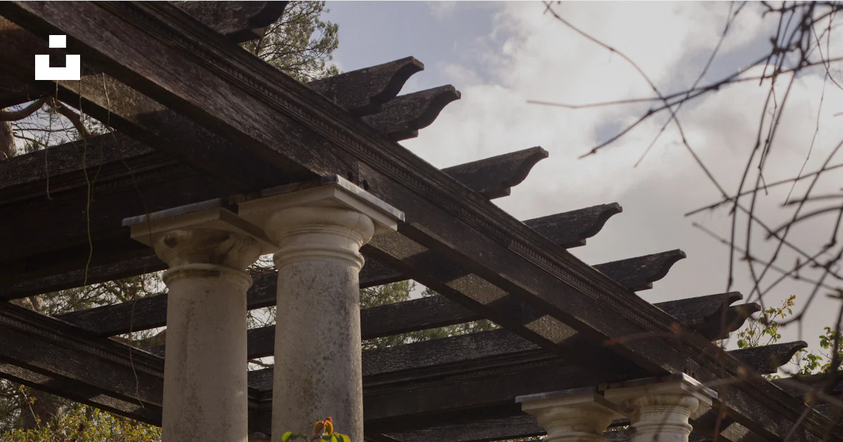 Columns and wooden trellis in a peaceful garden. photo – Free Grey ...