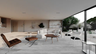 A modern living room with outdoor views.