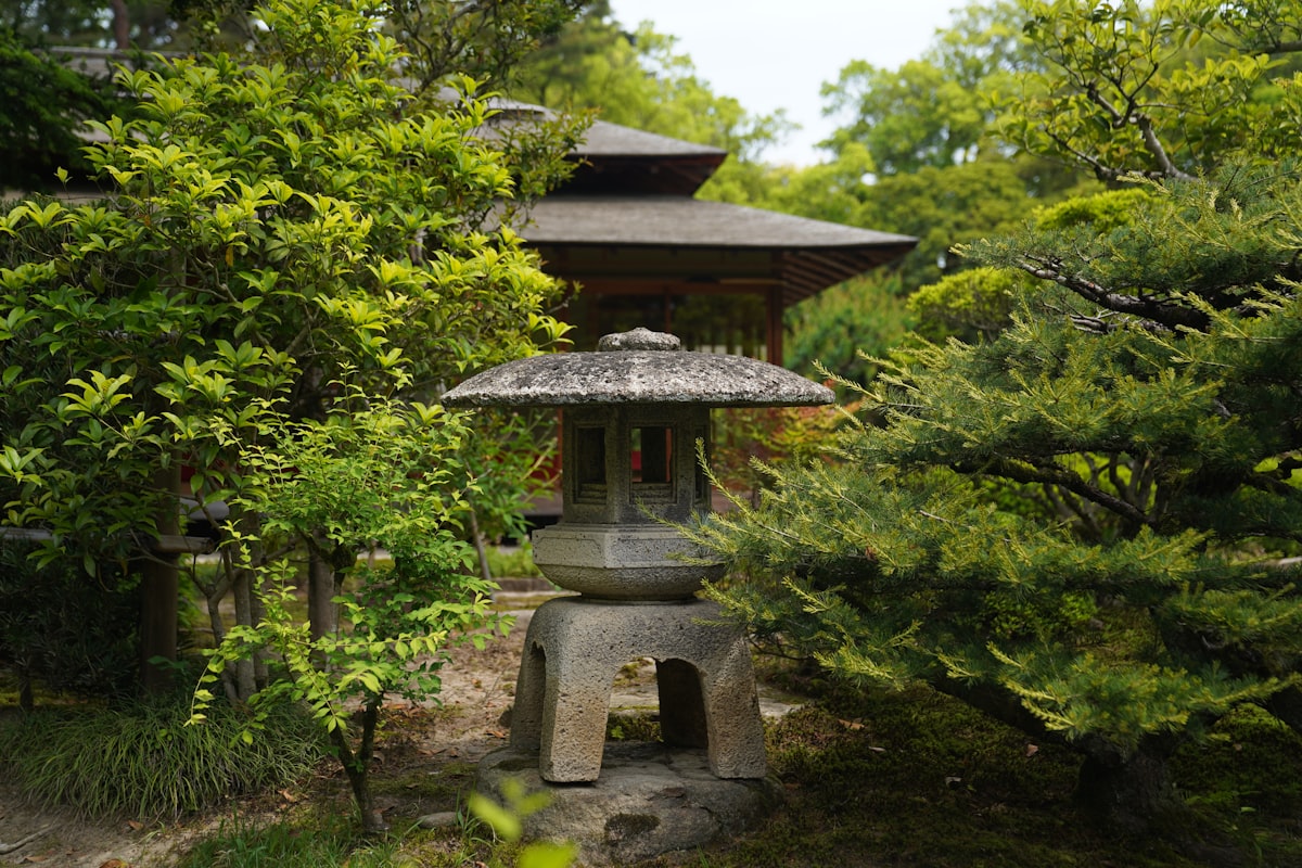 Kenroku-en stone lantern and pond Kanazawa Japan