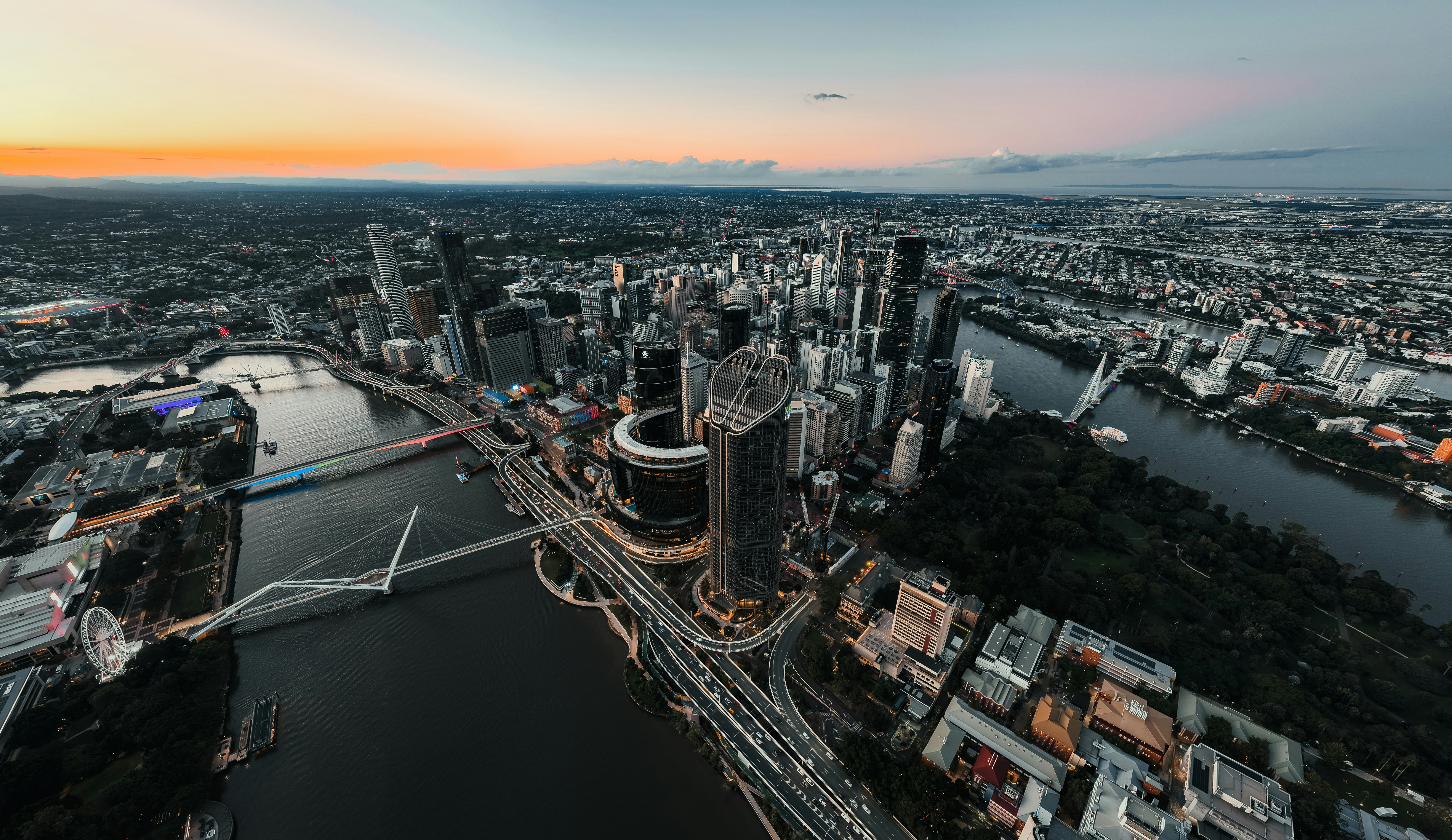 Aerial view of a city at twilight.