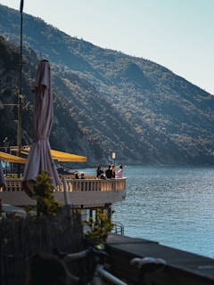 People enjoy a scenic view from a restaurant.