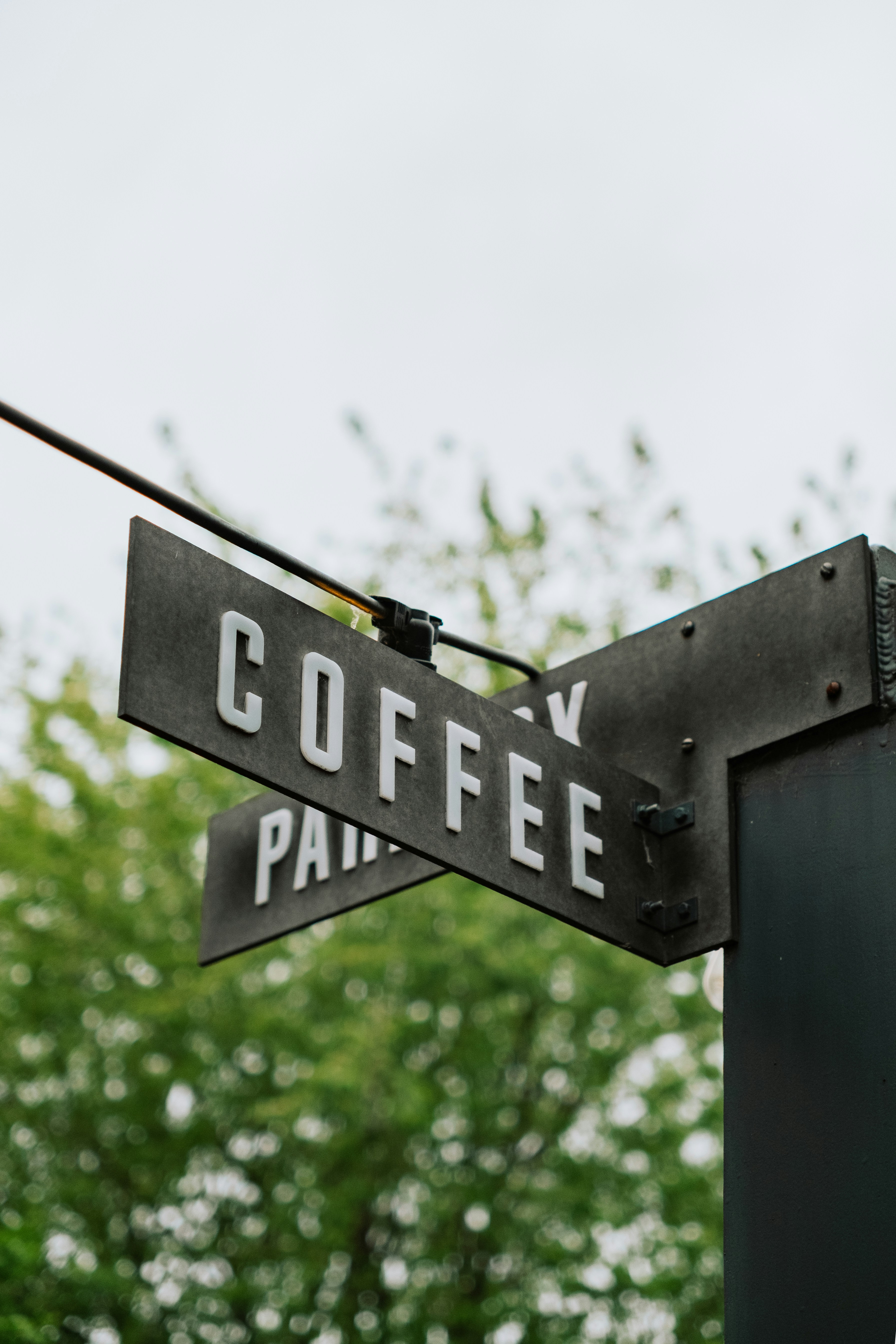 Coffee sign with "coffee" prominently displayed.