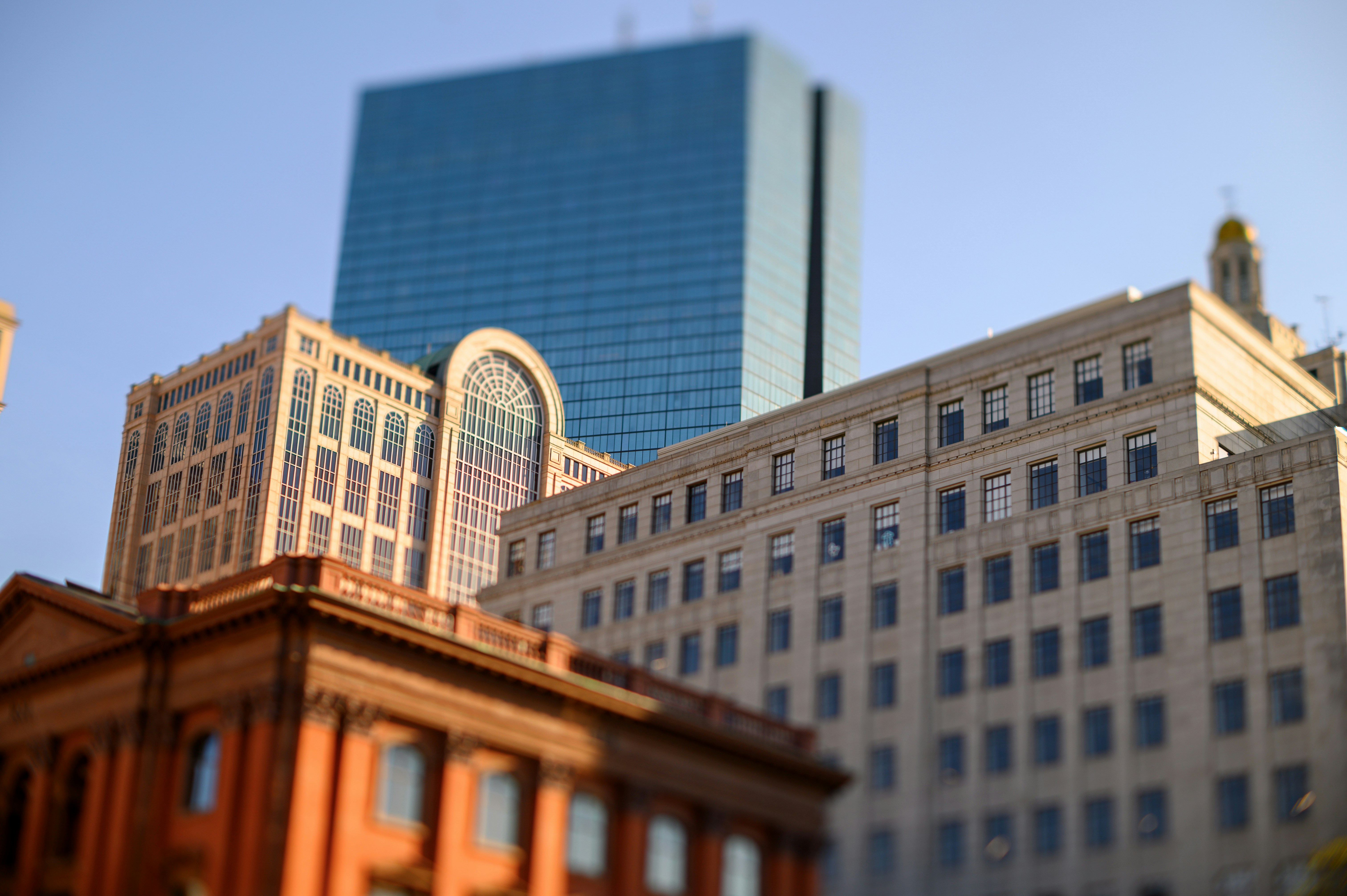 Skyscrapers and buildings fill a city skyline.