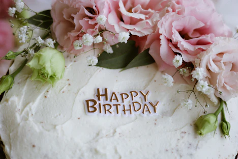 A birthday cake decorated with flowers