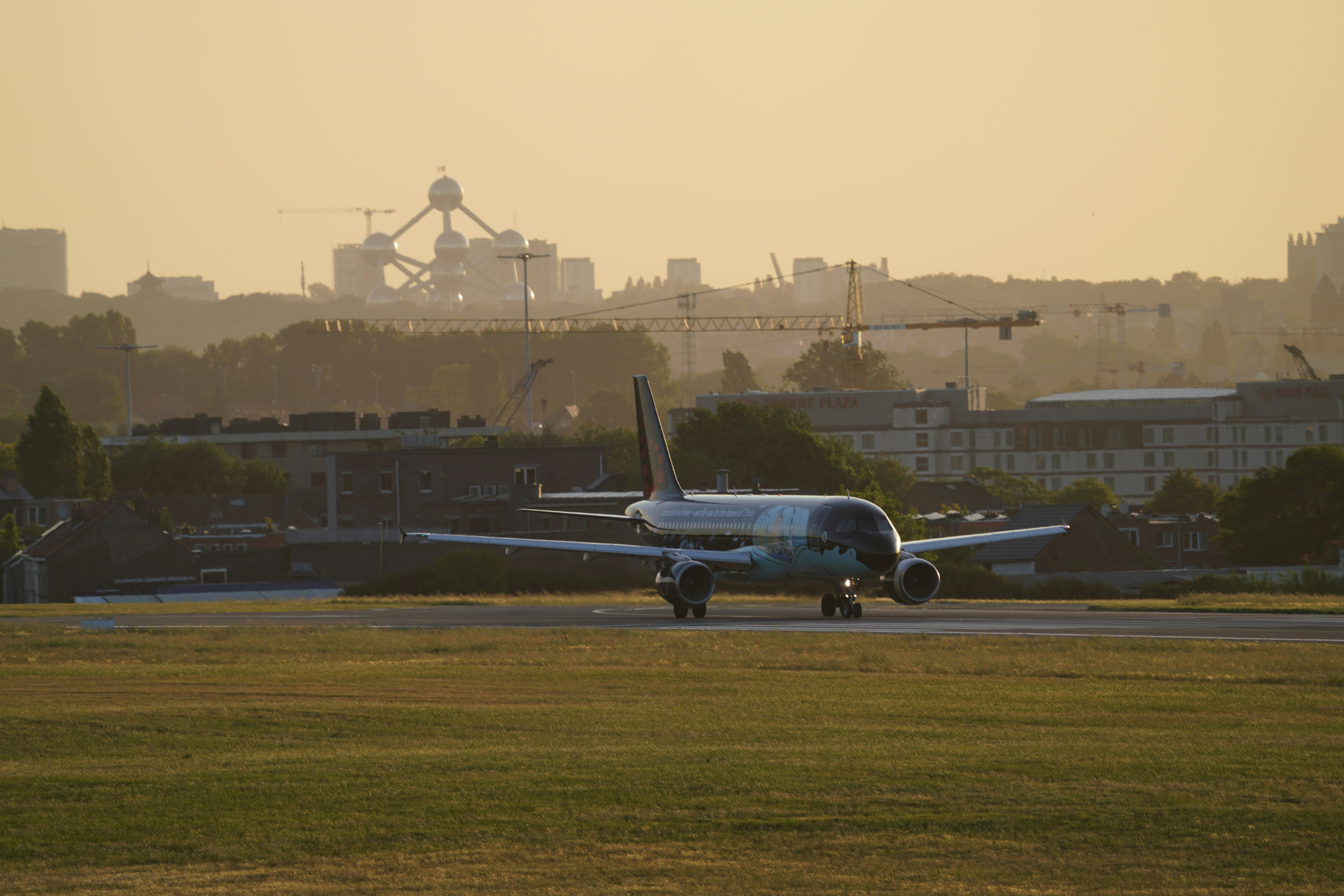 An airplane is taxiing on the runway.