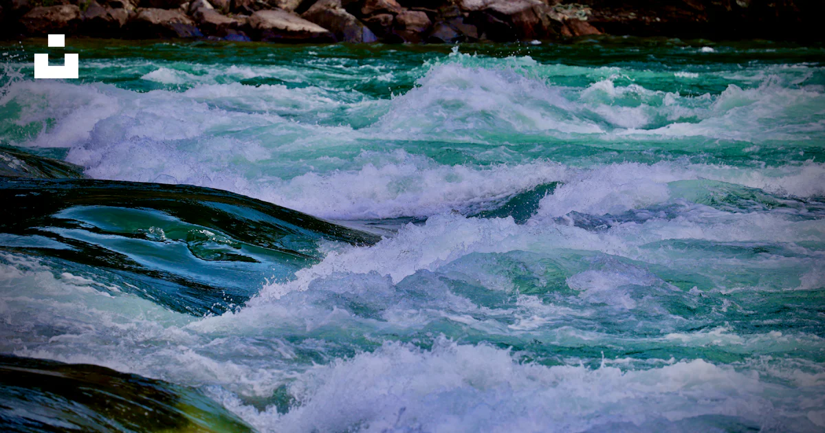 Water Rushing River Rushing river with foamy white water. photo – Free Blue river Image on ...