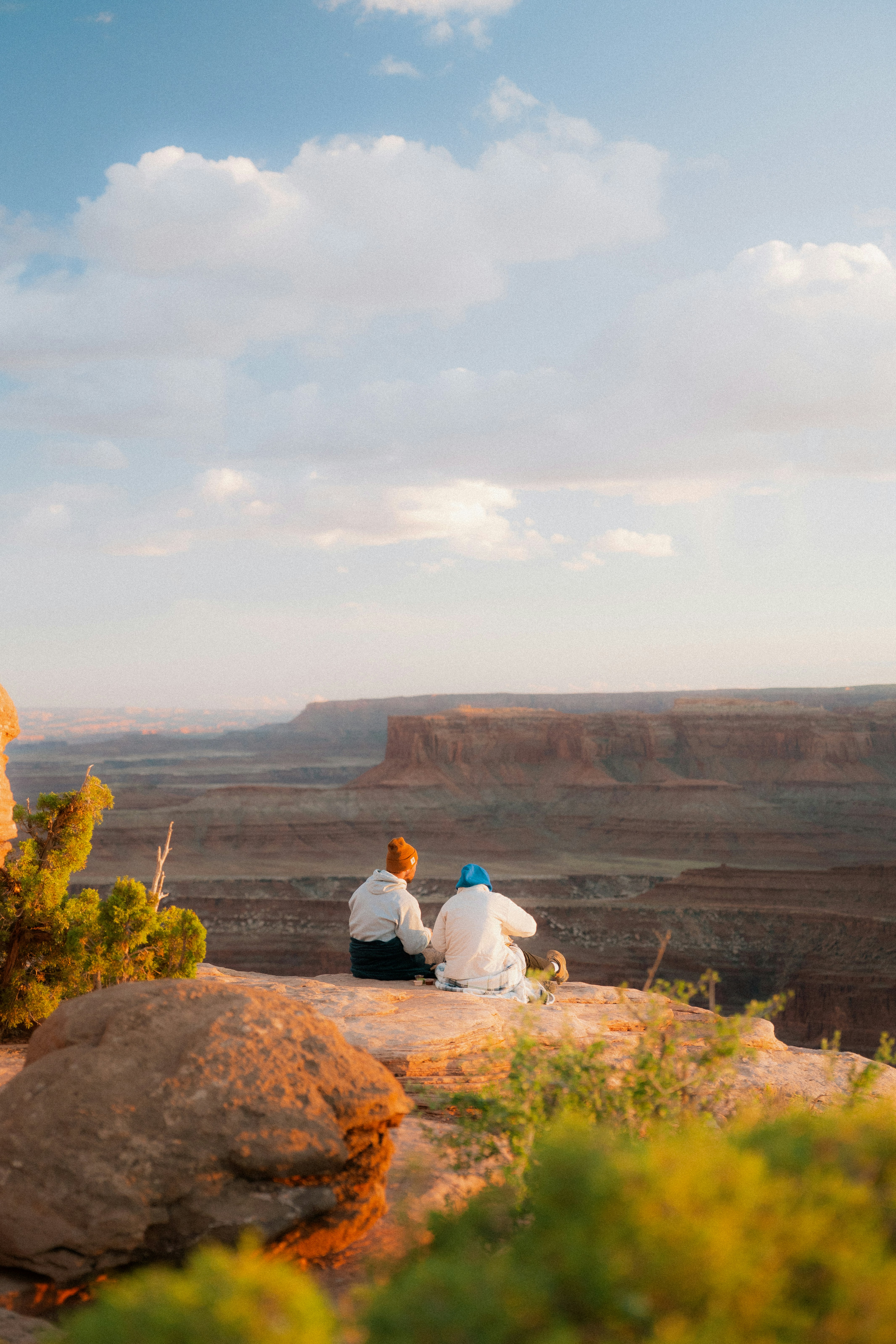 Two people admire the canyon's view