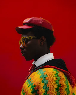 A stylish person is wearing colorful accessories.